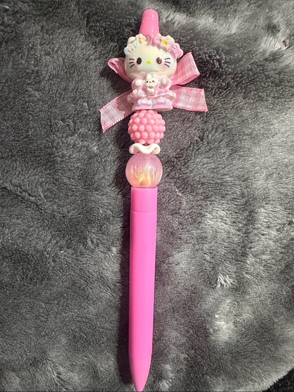 Pink Kitty Character Beaded Pen accented with a pink bow.